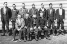 531: Group of 11 boys. (circa 1950) [courtesy of Lorna Richardson] / photo is not sharp /  ** also see 532 **  Standing left-to-right, Bill Barry, Vince Norman, Vince Carroll, Dave Ryan, Charlie Norman,  unidentified, Vince Ennis;  sitting left-to-right, Ray Carroll, Pat Ryan, ? Barry, unidentified.  - Bill Barry (of Thomas Barry &amp;amp; Anne Dollimont)  - Ray Carroll (of Michael Carroll &amp;amp; Josephine Barry)  - Vince Carroll (of Michael Carroll &amp;amp; Josephine Barry)  - Vince Ennis (of Vincent Ennis &amp;amp; Mary Carroll)  - Charlie Norman (of Charles Norman &amp;amp; Elizabeth Anne Barry)  - Vince Norman (of Peter Norman &amp;amp; Margaret Norman)  - Dave Ryan (of Jeremiah Ryan &amp;amp; Josephine Lambe)  - Pat Ryan (of Albert Ryan &amp;amp; Catherine Nolan)